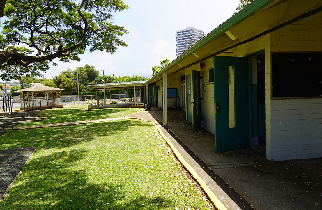 Outdoor view of the Early Achievers facility, showcasing a spacious and welcoming environment for early childhood education and development.