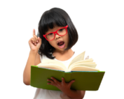 Young girl with red glasses reading a book and raising her finger, representing learning and curiosity at Early Achievers Preschool Hawaii
