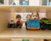 Early Achievers Preschool Hawaii children playing with toys in a classroom, supporting shy and anxious children through safe, engaging preschool activities